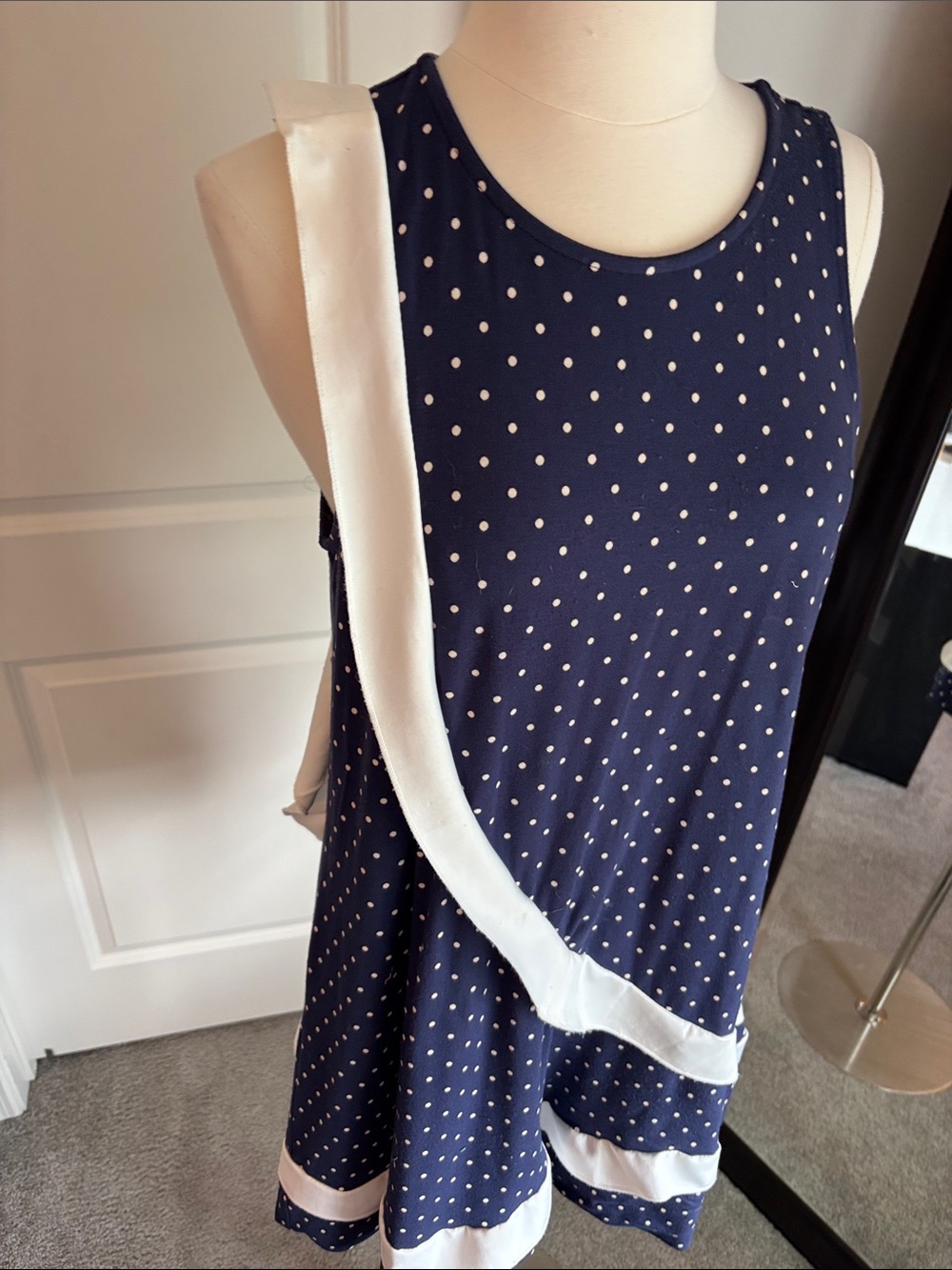Navy Polka Dot Sleeveless Swing Dress with White Trim